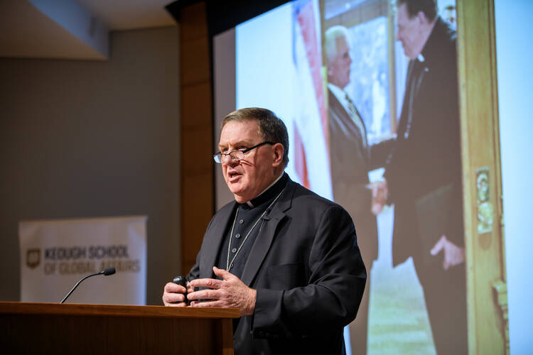 Cardinal-designate Joseph W. Tobin of Indianapolis speaks Oct. 14 at the University of Notre Dame. He discussed the history and current state of refugee resettlement in the United States. (CNS photo/Peter Ringenberg, University of Notre Dame) 