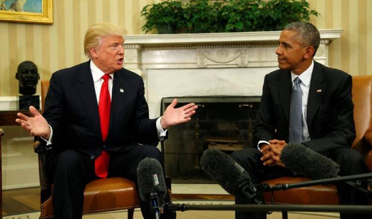 President-elect Donald Trump gestures during a Nov. 10 meeting with U.S. President Barack in the Oval Office of the White House in Washington. (CNS photo/Kevin Lamarque, Reuters)