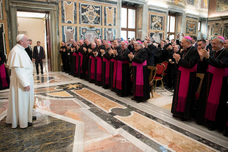 Pope Francis leads a meeting with bishops and seminarians associated with Pius XI Seminary at the Vatican Dec. 10. The seminary prepares priests for the Puglia region of southern Italy. (CNS photo/L'Osservatore Romano)
