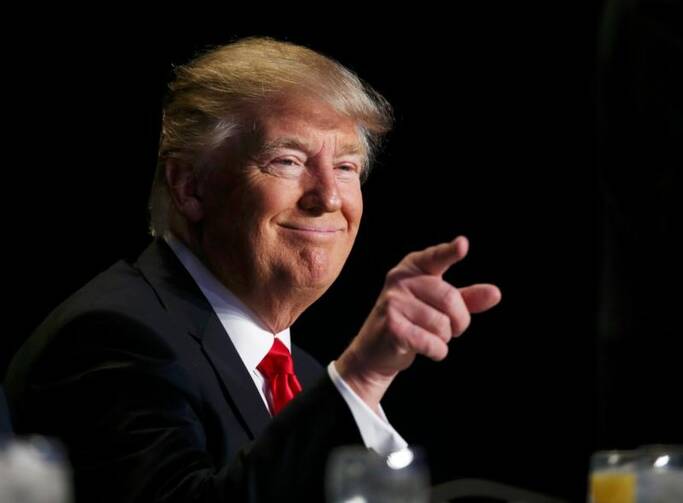 U.S. President Donald Trump gestures during the National Prayer Breakfast on Feb. 2 in Washington. (CNS photo/Carlos Barria, Reuters) 