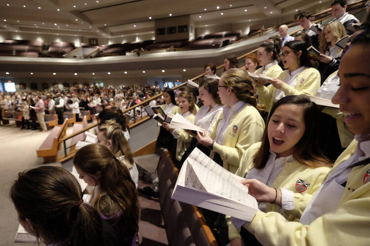 Students from various schools in the Diocese of Nashville, Tenn., provide music during a Mass on Feb. 1in celebration of Catholic Schools Week. (CNS photo/Rick Musacchio, Tennessee Register)