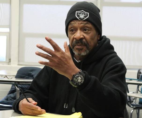 Bilal Ali, a human rights advocate and organizer with the San Francisco Coalition on Homelessness, participates in a small group session on Feb. 17 at the U.S. Regional World Meeting of Popular Movements in Modesto, Calif. (CNS photo/Dennis Sadowski) 