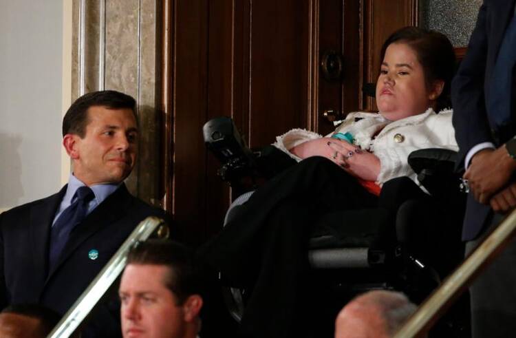 Megan Crowley listens as U.S. President Donald Trump addresses a joint session of Congress on Feb. 28 in Washington. . (CNS photo/Jonathan Ernst, Reuters)