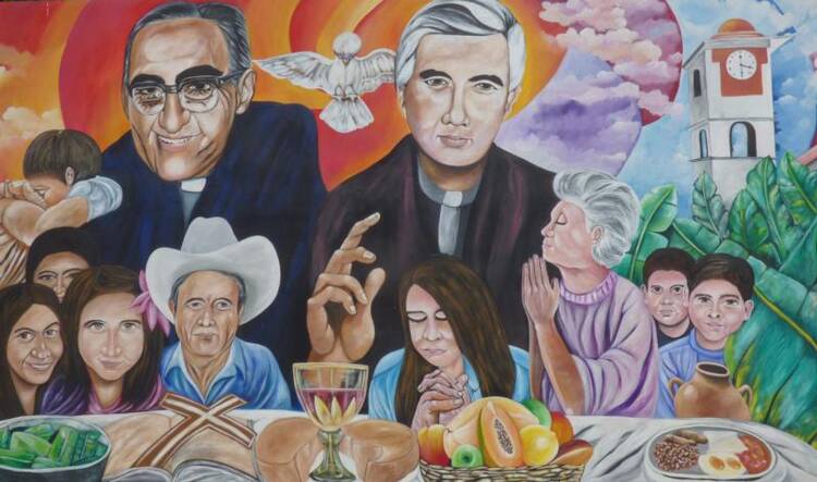 A mural in El Paisnal, El Salvador, seen in this Jan. 29 photo, features Blessed Oscar Romero and town native Father Rutilio Grande, surrounded by rural men, women and children, the community the Jesuit Father Grande served from 1972 until his March 12, 1977, assassination. (CNS photo/Rhina Guidos)