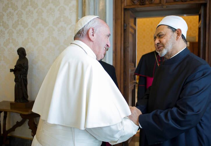 Pope Francis greets Ahmad el-Tayeb, grand imam of Egypt's al-Azhar mosque and university, during a private meeting in 2016 at the Vatican. (CNS photo/L'Osservatore Romano via Reuters)