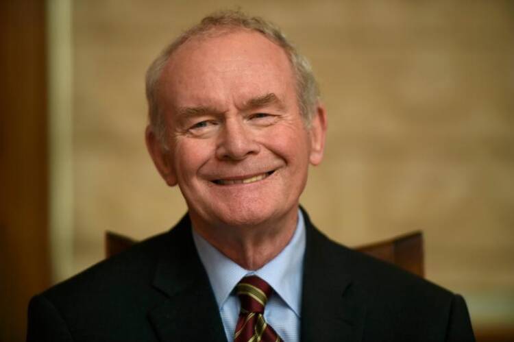 Martin McGuinness, Northern Ireland's former deputy first minister and former IRA leader-turned-peacemaker, smiles during a Jan. 23 news conference in Belfast. McGuinness died early on March 21 at age 66. (CNS photo/Clodagh Kilcoyne, Reuters)