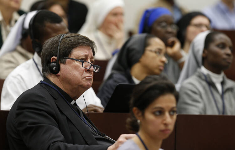  Brazilian Cardinal Joao Braz de Aviz, prefect of the Congregation for Institutes of Consecrated Life and Societies of Apostolic Life, attends a seminar on safeguarding children at the Pontifical Gregorian University in Rome March 23. The seminar was organized by the Pontifical Commission for the Protection of Minors. (CNS photo/Paul Haring) 