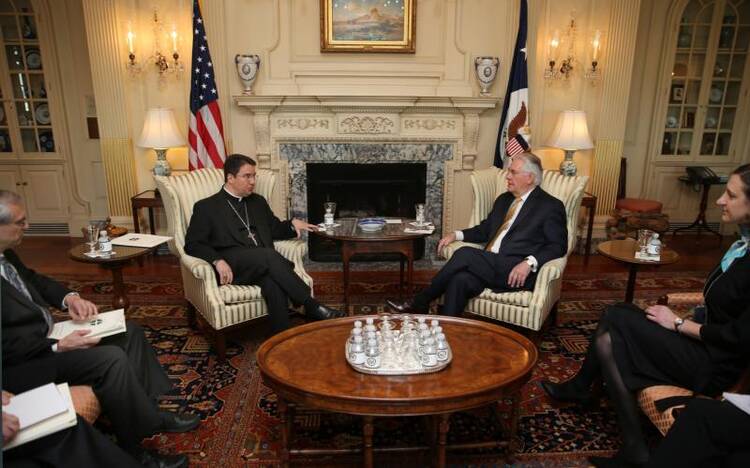 ishop Oscar Cantu of Las Cruces, N.M., gestures during a March 23 meeting with U.S. Secretary of State Rex Tillerson at the State Department in Washington. (CNS photo/Bob Roller)