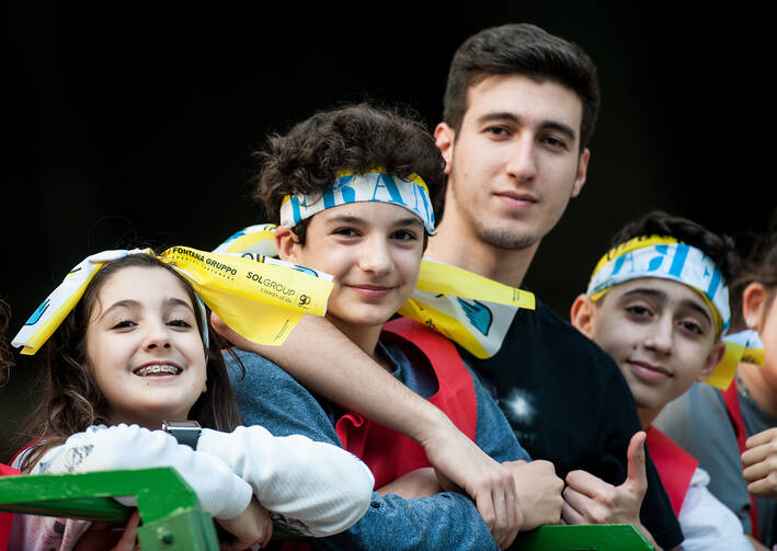 Young candidates for confirmation attend a visit by Pope Francis in Milan in March 2017. (CNS photo/Massimiliano Migliorato)