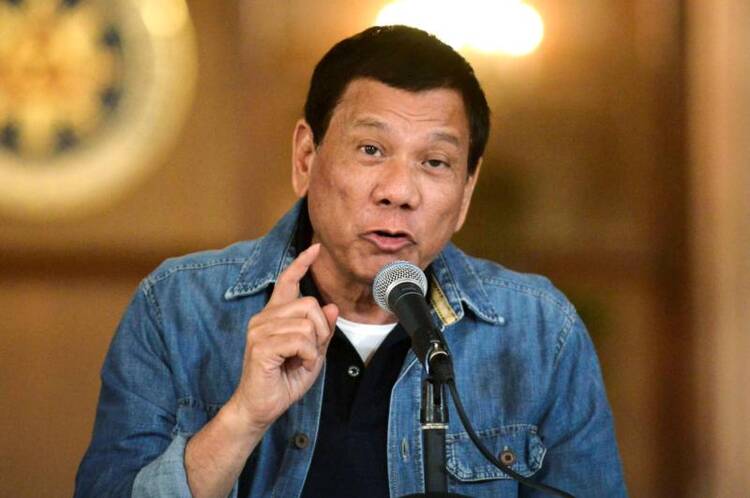 Philippine President Rodrigo Duterte announces the disbandment of police operations against illegal drugs on Jan. 30 in Manila. (CNS photo/Ezra Acayan, Reuters)