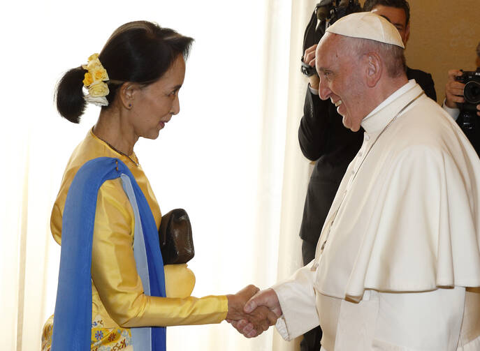 Pope Francis greets Aung San Suu Kyi, leader of Myanmar, during a private audience at the Vatican May 4. (CNS photo/Paul Haring)