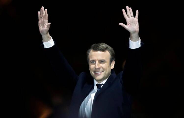 French President-elect Emmanuel Macron celebrates at his victory rally near the Louvre in Paris on May 7. (CNS photo/Christian Hartmann, Reuters)