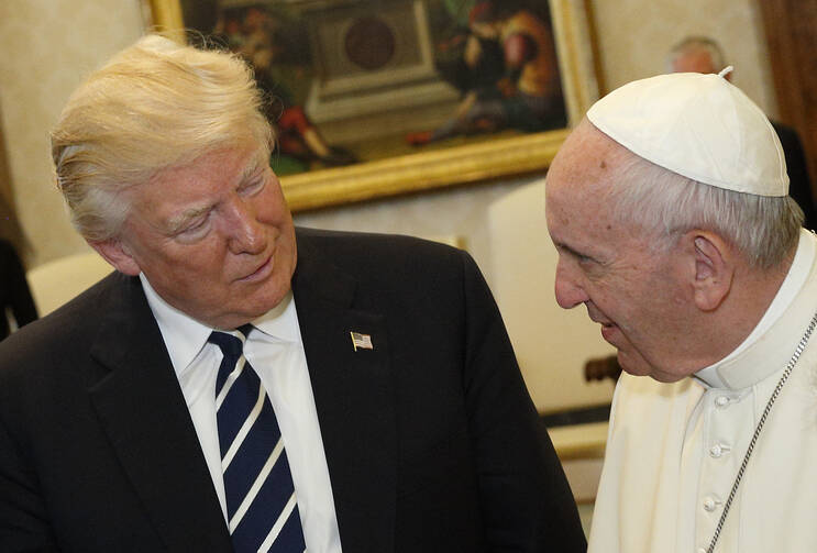 Pope Francis talks with U.S. President Donald Trump during a private audience at the Vatican in 2017. (CNS photo/Paul Haring)