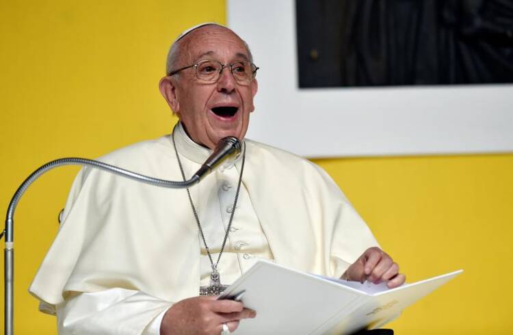 Pope Francis speaks to workers at the ILVA steel plant during his on May 27 pastoral visit in Genoa, Italy. (CNS photo/Giorgio Perottino, Reuters)