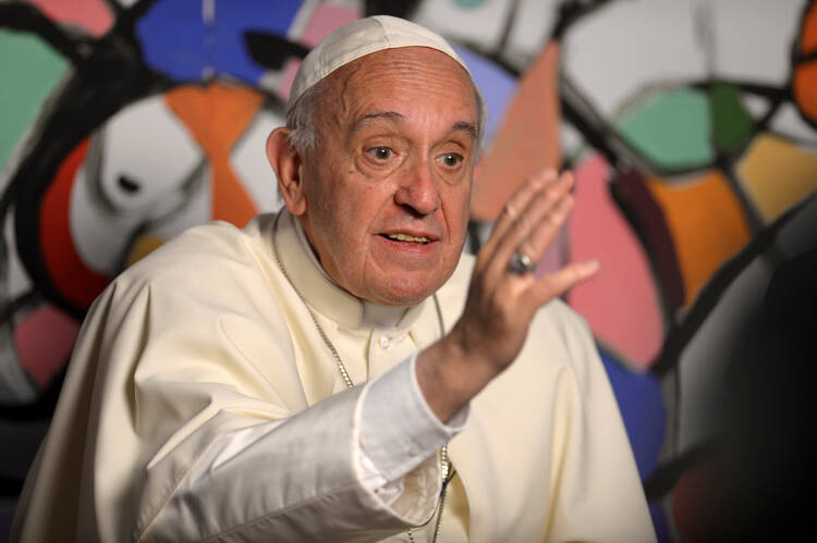 Pope Francis gestures as he speaks June 9 during the inauguration of the new Vatican office of the Scholas Occurrentes Foundation, which promotes the interface of education, art and sport to create a "culture of encounter for peace." (CNS photo/L'Osservatore Romano)