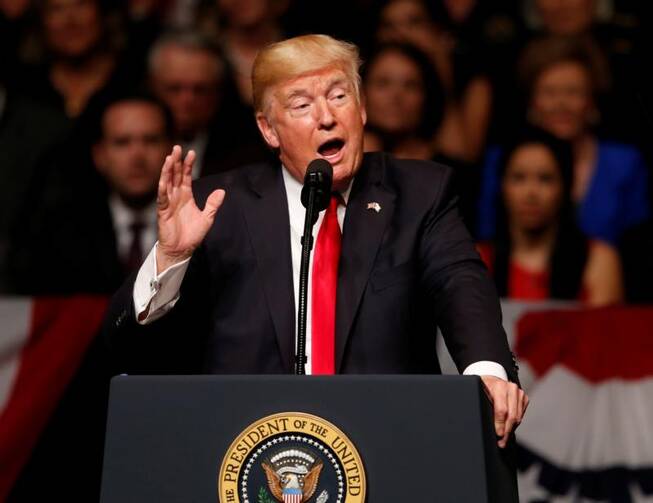 U.S. President Donald Trump announces his Cuba policy on July 16 at the Manuel Artime Theater in Little Havana, a neighborhood of Miami. (CNS photo/Joe Skipper, Reuters)