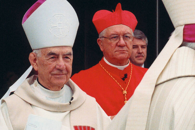 Retired San Francisco Archbishop John R. Quinn, left, is pictured in a 2004 photo in Saginaw, Mich. He died June 22 at age 88 in San Francisco. He headed the Northern California Archdiocese from 1977 until 1995. (CNS photo/Brett McLaughlin, Catholic Weekly)