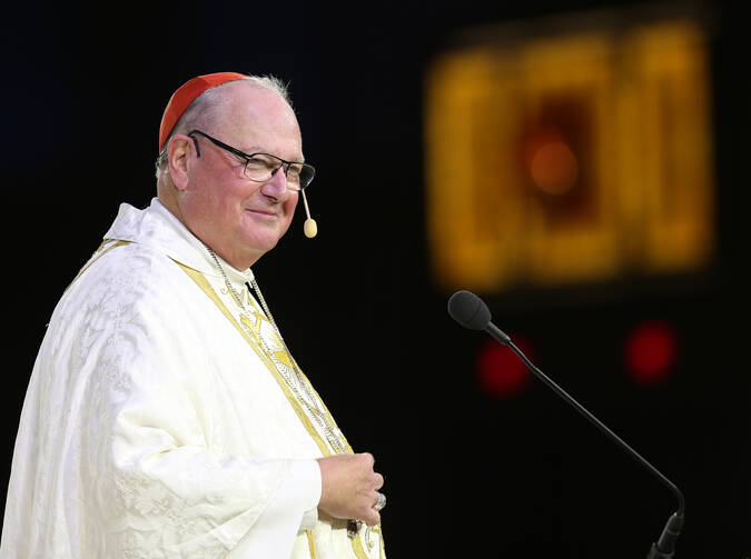 Cardinal Timothy M. Dolan of New York smiles as he delivers the homily during the opening Mass of the "Convocation of Catholic Leaders: The Joy of the Gospel in America" on July 1 in Orlando, Fla. (CNS photo/Bob Roller)