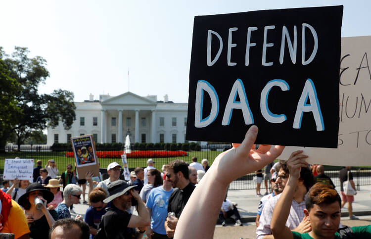 DACA supporters demonstrate near the White House in Washington on Sept. 5. (CNS photo/Kevin Lamarque, Reuters)