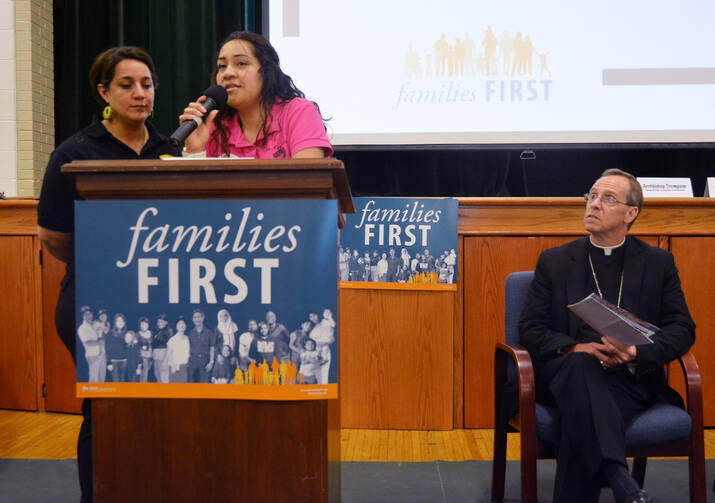 Maira Bordonabe, a member of St. Michael the Archangel Parish in Indianapolis and a married mother of two, shares her story of being taken for deportation at an Aug. 30 rally. (CNS photo/Natalie Hoefer, The Criterion)