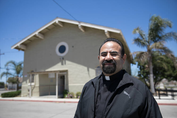 Father Enrique Herrera, pastor of Holy Trinity Church in Greenfield, Calif., is the winner of the 40th annual Lumen Christi Award of the Catholic Extension Society. He is pictured in a late June photo. (CNS photo/courtesy Catholic Extension Society)