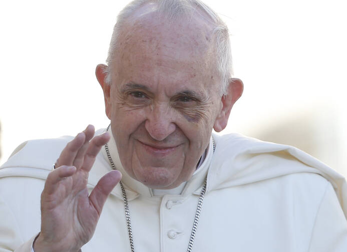 Pope Francis arrives to lead his general audience in St. Peter's Square at the Vatican Sept. 20.