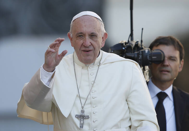 Pope Francis arrives to lead his general audience in St. Peter's Square at the Vatican Oct. 4. (CNS photo/Paul Haring) 