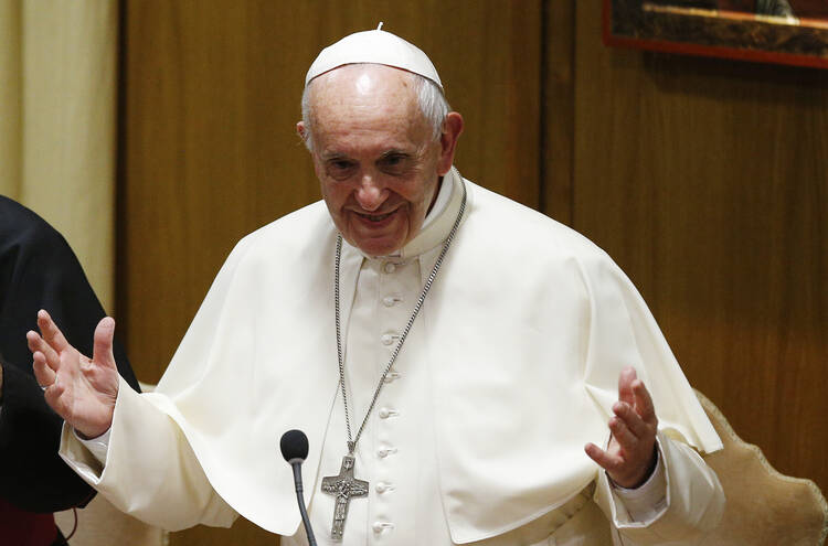 Pope Francis gestures after addressing the general assembly of the Pontifical Academy for Life at the Vatican Oct. 5. (CNS photo/Paul Haring)