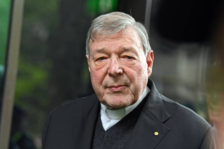 Australian Cardinal George Pell departs the Melbourne Magistrates' Court in Australia on Oct. 6. (CNS photo/James Ross, EPA)