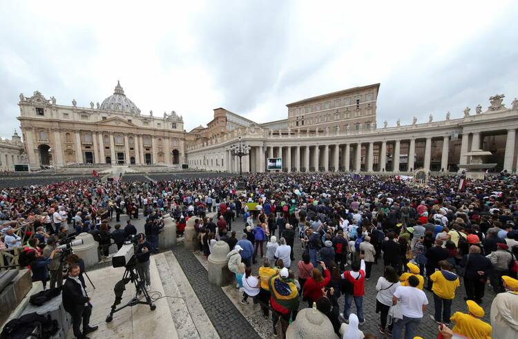 A large crowd is seen as Pope Francis leads the Angelus in St. Peter’s Square Oct. 22 at the Vatican. (CNS photo/Tony Gentile, Reuters)