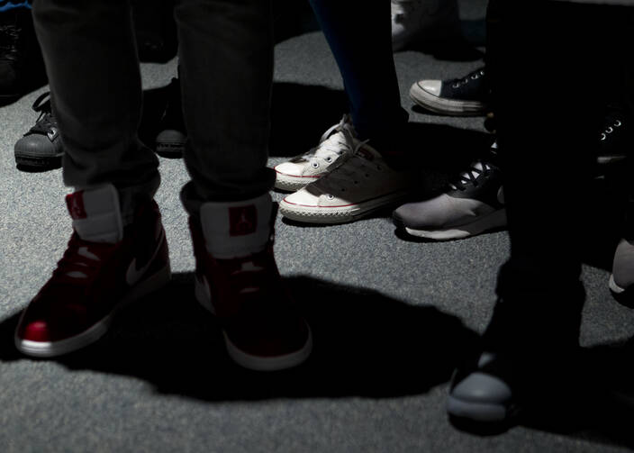 Young people stand during a daylong regional encuentro Oct. 28 at Herndon Middle School in Herndon, Va.  (CNS photo/Tyler Orsburn)