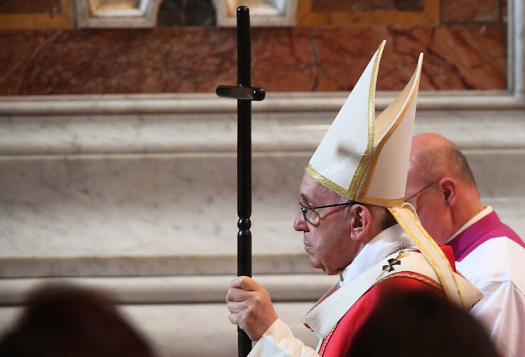 Pope Francis leaves St. Peter's Basilica after celebrating a Mass for deceased cardinals and bishops on Nov. 3. (CNS photo/Maurizio Brambatti, EPA)