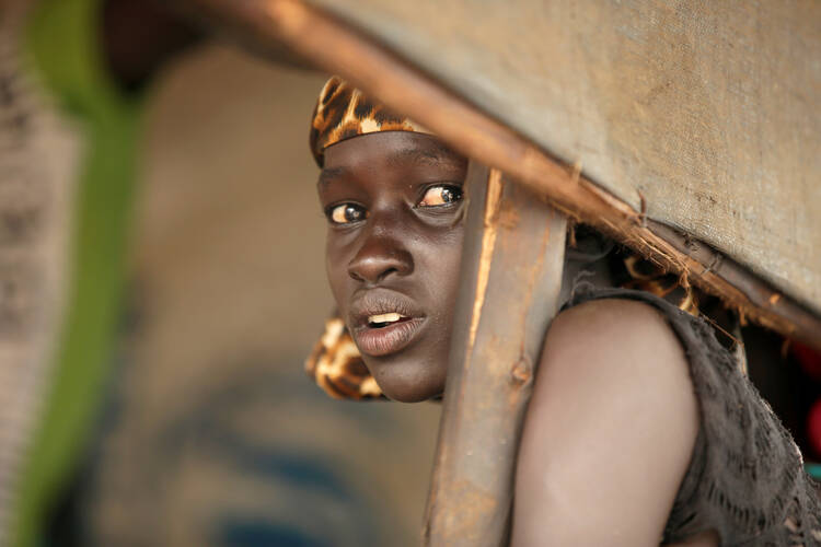 A South Sudanese girl is seen at the Nguenyyiel refugee camp in Gambella, Ethiopia, in October 2017. (CNS photo/Tiksa Negeri, Reuters)