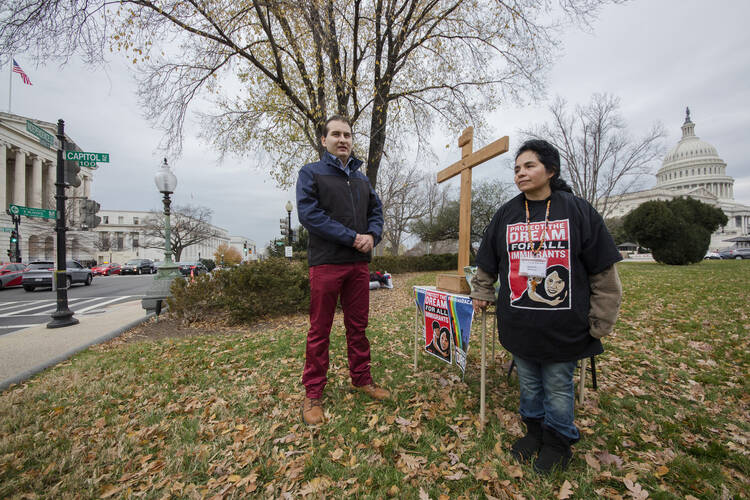 Daniel Galan and Antonia Alvarez advocate for the passage of the DREAM Act near the U.S. Capitol building in Washington Dec. 5. They were fasting and praying for 10 days to draw attention to the immigration issue. (CNS photo/Jaclyn Lippelmann, Catholic Standard)