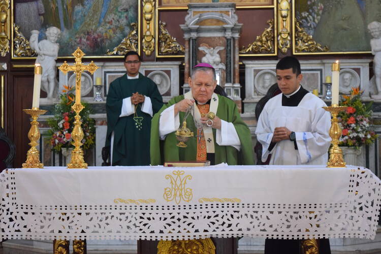 Archbishop Antonio Lopez Castillo of Barquisimeto, Venezuela, celebrates Mass on Jan. 28 at Santa Rosa Church in Barquisimeto. (CNS photo/Cody Weddle)