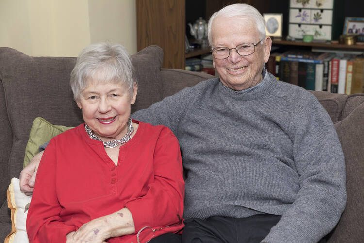 Bess June and John Lane, who will celebrate their 60th wedding anniversary at the end of National Marriage Week, which is Feb 7-14, pose for a Feb. 6 photo at their home in Rye, N.Y. Laughter, tolerance and shared faith are important ingredients in a loving, lasting marriage, according to the New York couple. (CNS photo/JoAnn Cancro Photography)