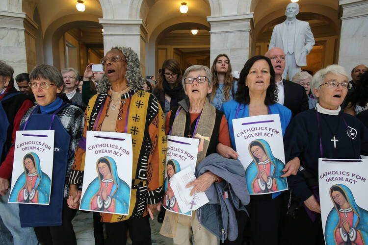 Sisters of Mercy and others pray inside the Russell Senate Office Building in Washington Feb. 27 during a "Catholic Day of Action for Dreamers" protest to press Congress to protect "Dreamers." (CNS photo/Bob Roller) 