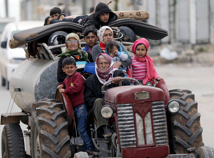 RESIDENTS FLEE SYRIAN VILLAGE