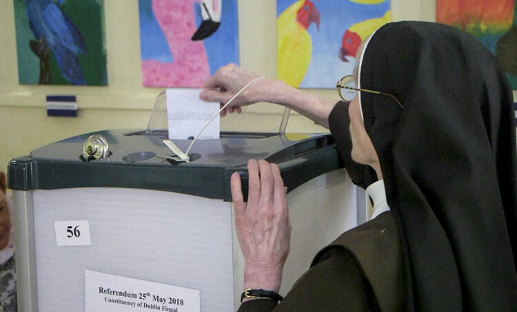 A woman religious casts her ballot May 25 in Dublin as Ireland holds a referendum on its law on abortion. Voters went to the polls May 25 to decide whether to liberalize the country's abortion laws. (CNS photo/Alex Fraser, Reuters)