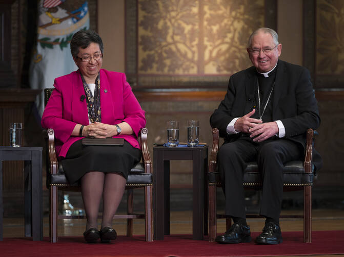 Sister Teresa Maya, a member of the Sisters of Charity of the Incarnate Word and president of the Leadership Conference of Women Religious, and Los Angeles Archbishop Jose H. Gomez, vice president of the U.S. Conference of Catholic Bishops, speak at the "Overcoming Polarization" conference at Georgetown University in Washington. (CNS photo/Tyler Orsburn) 