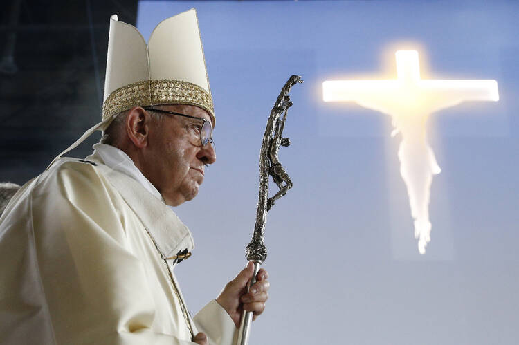 Pope Francis arrives in procession to celebrate Mass at the Palexpo convention center in Geneva June 21. (CNS photo/Paul Haring)