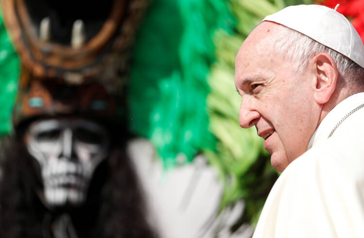 Pope Francis arrives to pose for pictures with participants of the Mexican state of Quintana Roo during his general audience in St. Peter's Square Aug. 29 at the Vatican. (CNS photo/Alessandro Bianchi, Reuters) 