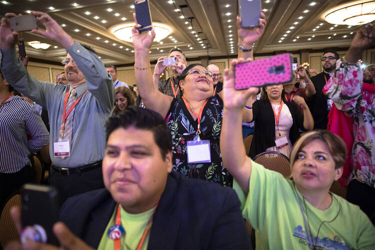 Delegates celebrate the Sept. 23, 2018, closing session of the Fifth National Encuentro, or V Encuentro, in Grapevine, Texas. (CNS photo/Tyler Orsburn) 