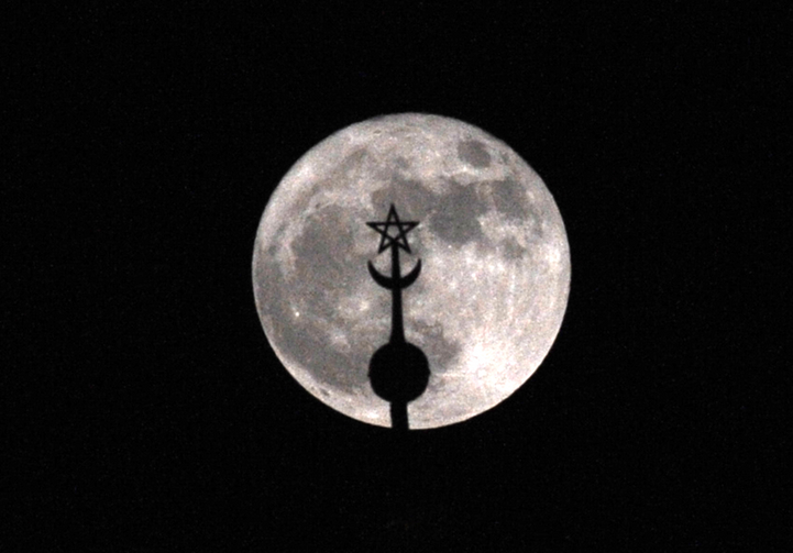 Image: In this 2016 file photo, a super moon rises above the roof of the Mohammed V mausoleum in Rabat, Morocco. Pope Francis is scheduled to visit the North African nation in March 2019. (CNS photo/Abdelhak Senna, EPA)