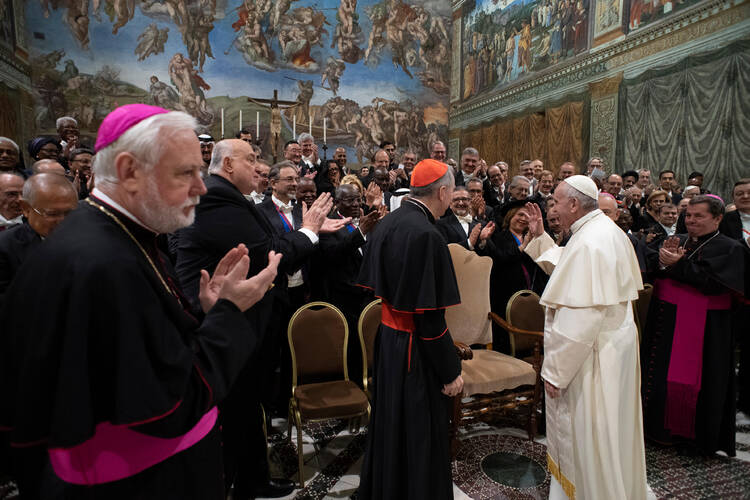 Pope Francis exchanges greetings for the new year with diplomats accredited to the Holy See on Jan. 7. (CNS photo/Ettore Ferrari, pool via Reuters) 