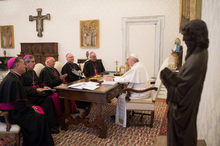 Pope Francis meets with the leadership of the Chilean bishops' conference at the Vatican on Jan. 14 to talk about the sex abuse crisis affecting the church in Chile. (CNS photo/Vatican Media)