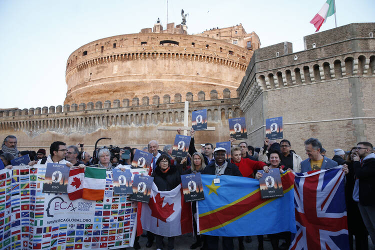  Clerical sex abuse survivors and their supporters rally outside Castel Sant'Angelo in Rome Feb. 21, 2019. (CNS photo/Paul Haring)