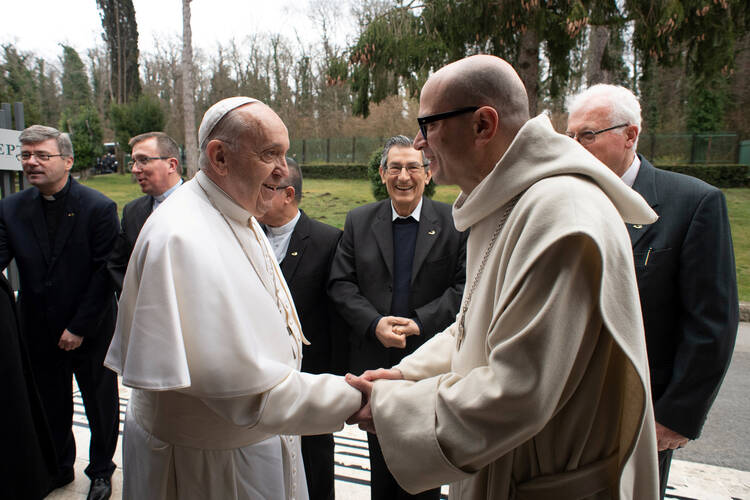 Pope Francis greets Benedictine Abbot Bernardo Gianni during the Lenten retreat for the Roman Curia in Ariccia, Italy, on March 10. (CNS photo/Vatican Media via Reuters) 