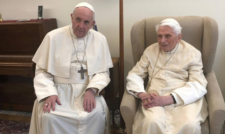 Pope Francis meets with retired Pope Benedict XVI at the Vatican April 15, 2019.