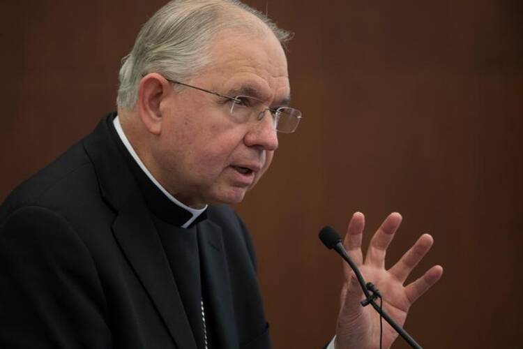 Archbishop Jose H. Gomez of Los Angeles speaks during a lecture at The Catholic University of America in Washington Feb. 6, 2019. The Los Angeles Archdiocese and five other California dioceses, Fresno, Orange, Sacramento, San Bernardino and San Diego, announced a new independent compensation program for sex abuse victims. Archbishop Gomez and the state's other Catholic bishops also are speaking out against a bill to do away with the seal of confession in cases of abuse. (CNS photo/Bob Roller)